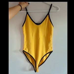 Super cute yellow body suit